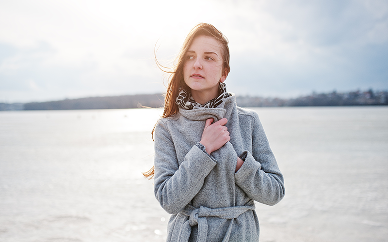 model poses female facing but looking away to the side from the camera