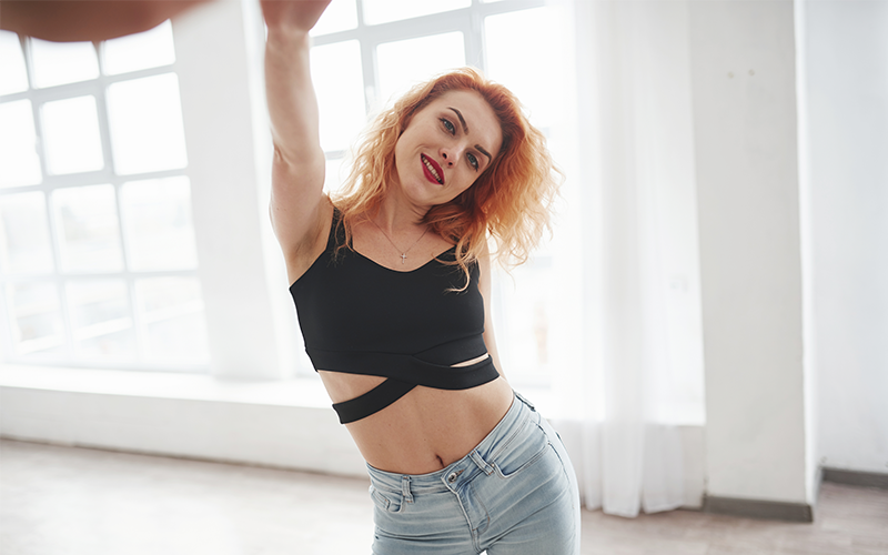 female model posing and making a fake waist