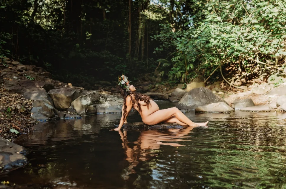 Nude maternity shoot in nature