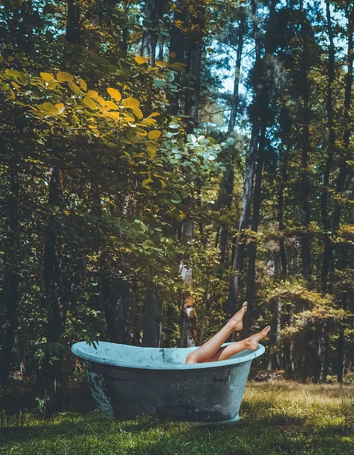 woman posing in a forest