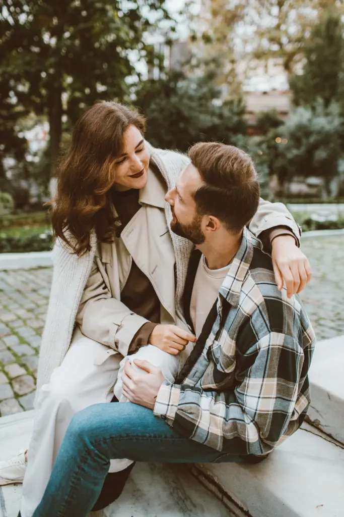 Woman sitting on a mans lap