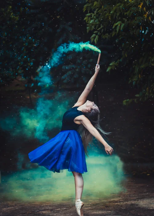 woman posing with a color bomb