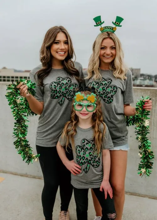 photograph models wrapped in tinsel garland