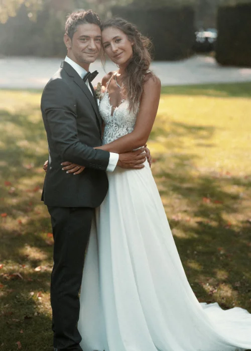 Embrace from the side wedding pose